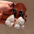 Shell Daisy Flower Affordable Luxury Style Stud Earrings MegaBDM