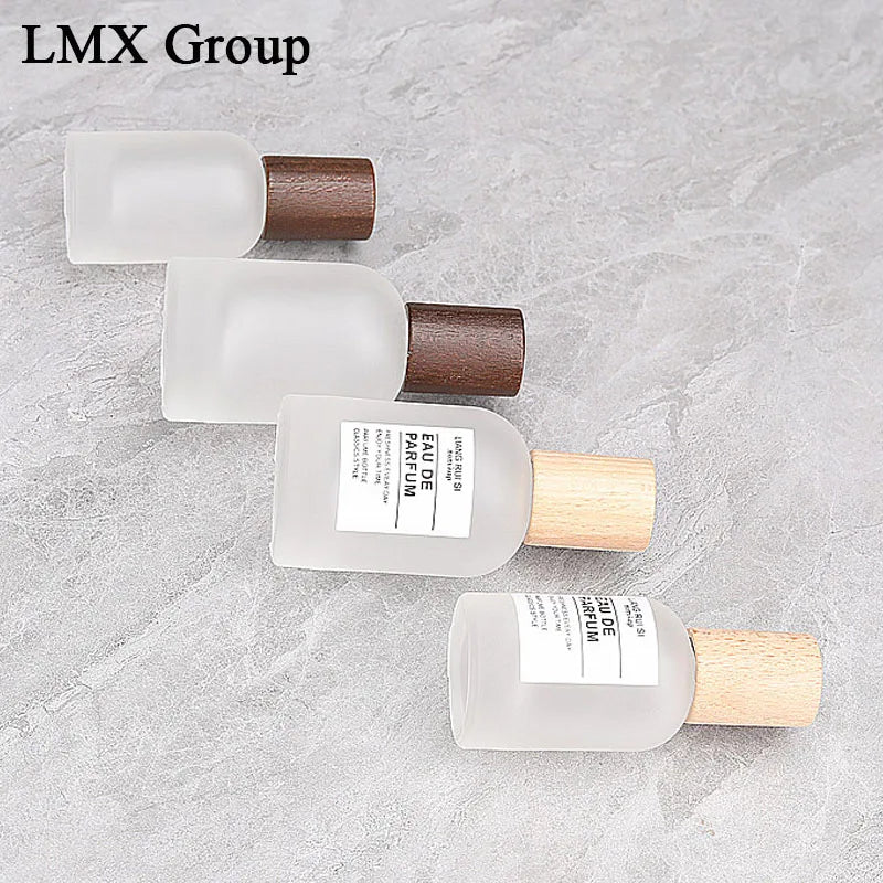 Luxury Perfume Bottles 30ml 50ml Empty Glass Clear Cosmetic Cylinder Spray Cap Pump Sprayer 100pcs MOQ Screen Printing MegaBDM