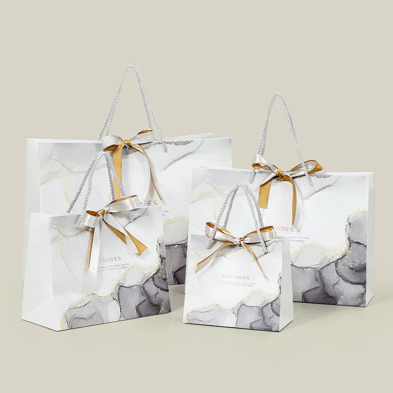 MU PACKING Fashion Bow Hand Garment Bag Gift Marble Embossed Art Paper Bag With Handles Shopping