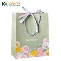 KAKA Custom Logo Flowers Gift Paper Bag Foldable Luxury Boutique Packaging for Wedding & Cosmetics with Ribbon and Cotton Handle