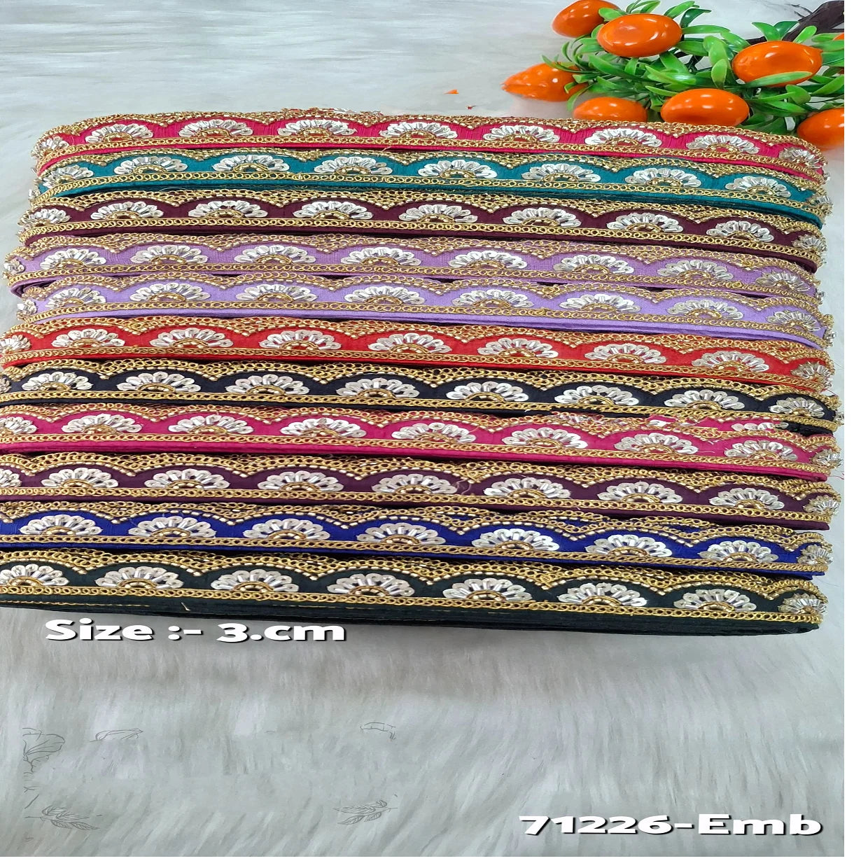 custom made scalloping patterned heavy sequins work machine embroidered laces in eleven colours for garments in 3 cms width.