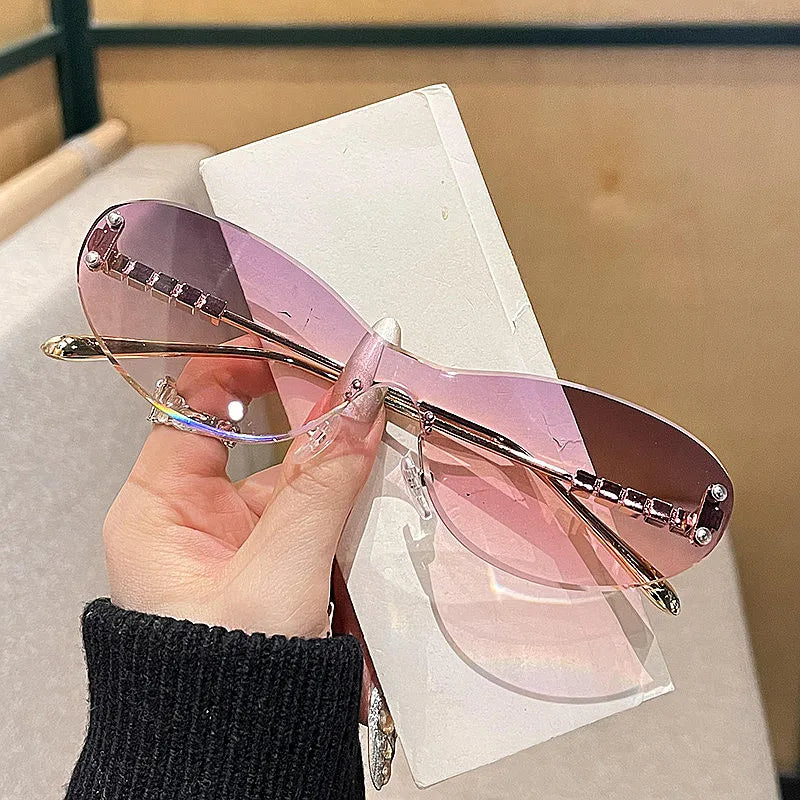 2025 Custom Logo Newest Fashion Women Rimless Y2k Sunglasses UV400 Small Frame Cat Eye Sunglasses Women