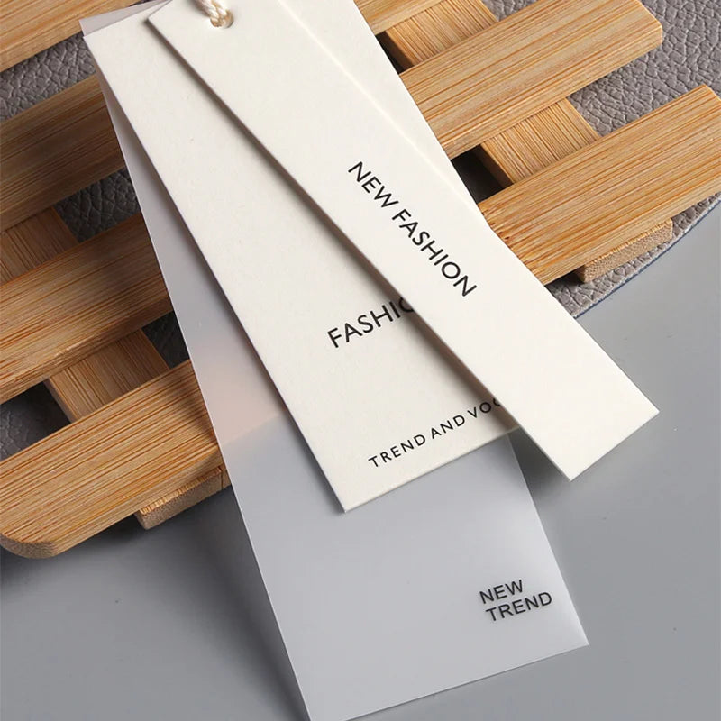 Fashion Embossed Swing Paper Price Tags Luxury Matte Logo Hangtags Clothing Custom Hang Tag for Garment Brand Hand Tag