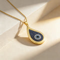 QIKU Creative Water Drop Design Blue Crystal Eye Pattern Pendant Unusual Design Necklace Copper Zircon Jewelry Women Girl Gift