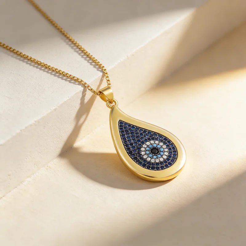 QIKU Creative Water Drop Design Blue Crystal Eye Pattern Pendant Unusual Design Necklace Copper Zircon Jewelry Women Girl Gift