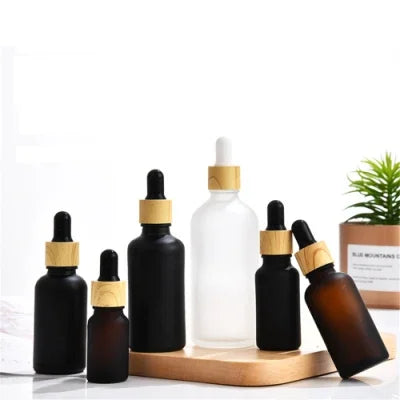 White Skin Care Oil Dropper Bottle 5ml 30ml 50ml 100ml Frosted Cosmetics Glass Botella Vidrio Oil Bottle Black Dropper Bottle