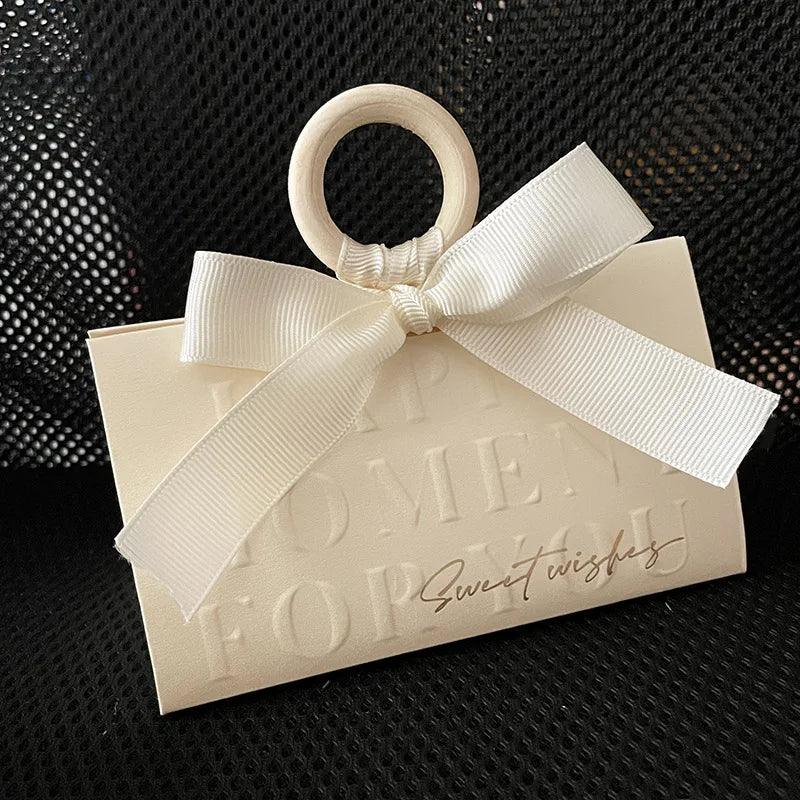 JUXINDA Wholesale Handheld Triangular Wedding Candy Box with Wooden Ring Wedding Favor Box Wedding Banquet Candy Box