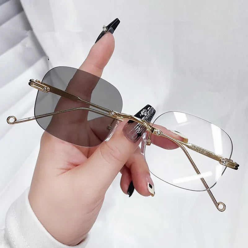 2025 Retro Fashion Outdoor Lens Color Changing Glasses Alloy Rimless Photochromic Anti Blue Light Glasses for Women MegaBDM