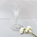 High Borosilicate Glass Oil Jug with Graceful Arc-Shaped Spout Divided Design for Precise Kitchen Oil Dispensing Bottle Shape