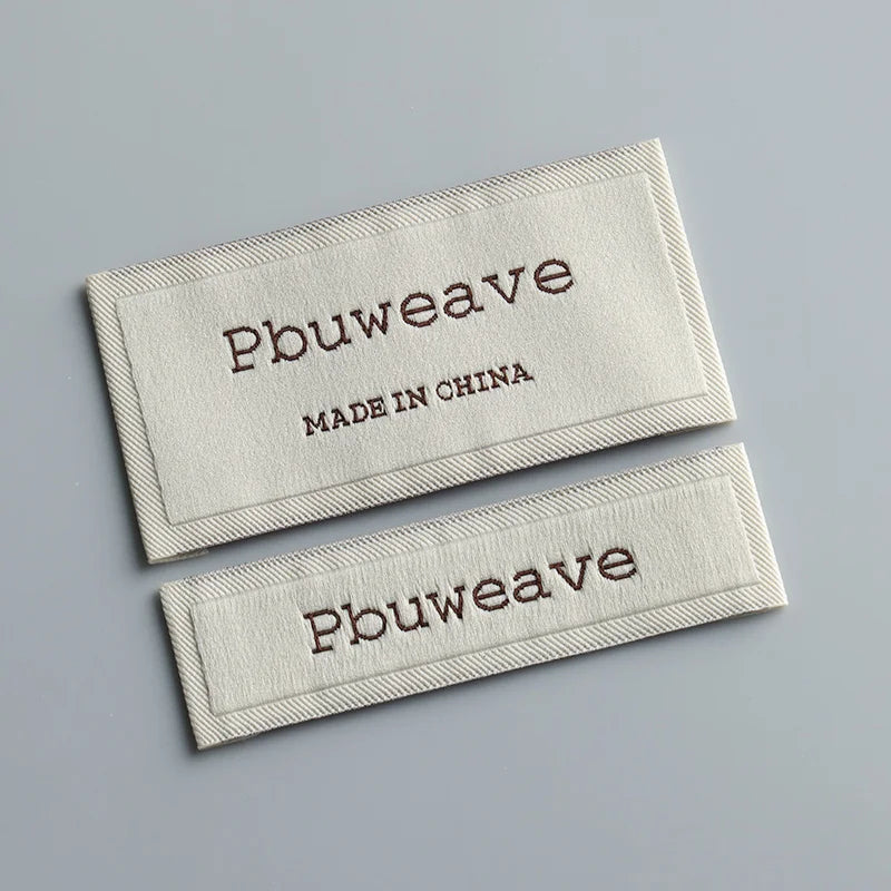OEM/ODM Eco-Friendly Durable Woven Neck Labels for Clothing Fold Garment Woven Labels with Brand Name