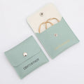 PUPPYSEW Wholesale Aqua Green PU Leather Jewelry Bag Pouch  Faux Leather Bag  Necklace Ring Bracelet Pouch With Logo