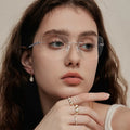 FEROCE Wholesale Unisex Fashion Eyeglasses Luxury Rimless Square Lightweight Comfortable HighQuality Pure Titanium Frames for