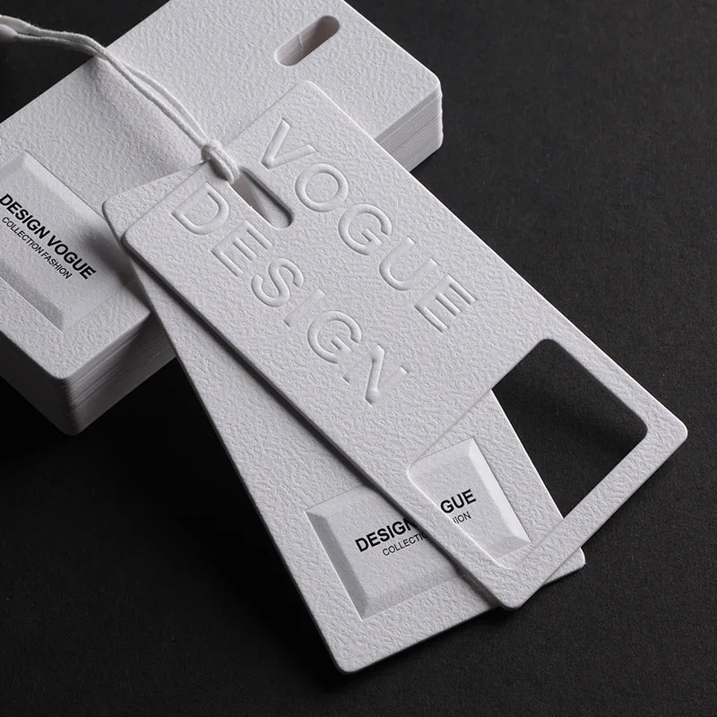 Low Moq Factory Custom Hang Tag Embossed Logo White Matte Paper Hang Tags Clothing Label