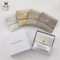 Wholesale Gold 8*8cm PU Leather Bag Jewelry Pouch Bag  with Snap Button Closure Gift Package Bag  With Logo Custom