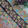Custom made in  2.5 inch width on cotton base fabric floral embroidered laces in four colour ways for garments and for resale.