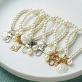 Pearl Shell Car Keychain Creative Pearl Bracelet Beaded Mobile Phone Ornaments Metal Car Keychain Accessories