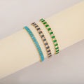 QIKU Wholesale Adjustable Bling Gold Plated Crystal Zircon Copper Fine Chain Link Tennis Bracelet Charms for Women