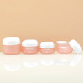 Custom Luxury 15g 20g 30g 50g Mini Glass Cosmetic Eye Cream Jar Plastic Lid Face Cream Jar Pink Skincare Packaging Container