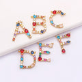 QIKU Wholesale a to Z Letter Initial Pendant Tarnish Free Gold Plated Crystal Chinese New Year Mini Charms for Jewelry Making