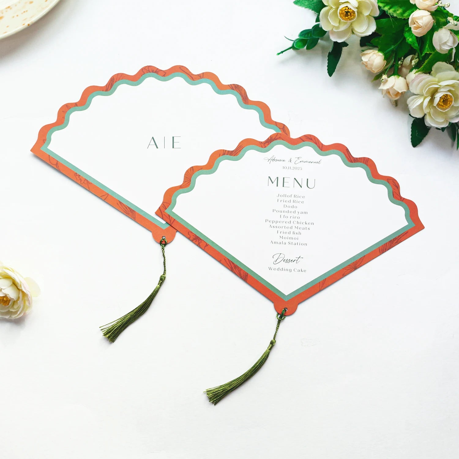 Stylish Fan Style Wedding Menu Card with Ornate Border Design and Tassel Hanging Decoration for Wedding Event