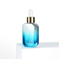 Manufacturer Eco Friendly Blue Transparent Rectangle Flat Serum Dropper Bottle 30ml with a Dropper