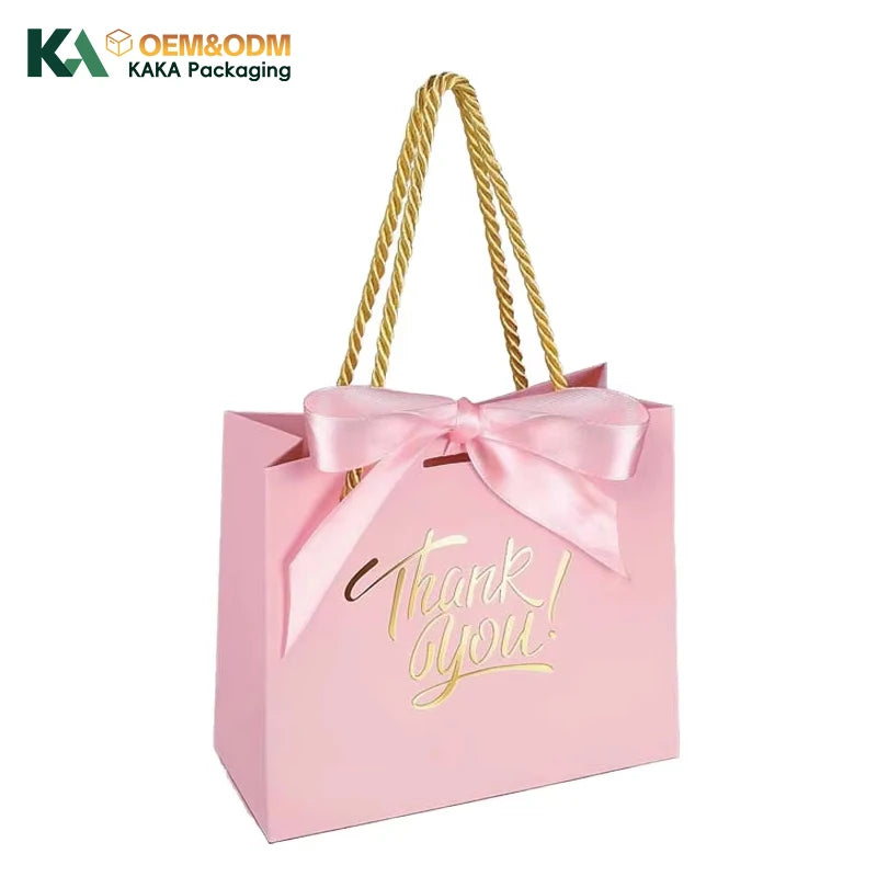 KAKA Custom Luxury Pink Paper Gift Bag With Gold Foil Thank You Logo Ribbon Handle Shopping Packaging For Wedding Party