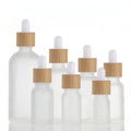 5ml 10ml 15ml 20ml 30ml 50ml 100ml Frosted Green Blue Amber Essential Oil Glass Dropper Bottle with Bamboo Lid