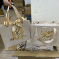 Luxury Gift Paper Bag with Hot Foil Stamping Ribbon Closure and Custom Design for Jewelry or Perfume Packaging
