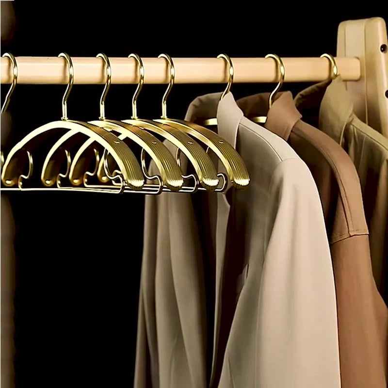 Direct Factory Sale Short Glossy Flexible Clothes Hangers for Wardrobe Custom Logo Fancy Costume Hangers for Living Room
