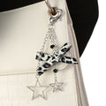 Mengda Fashionable silver chain with hollow stars leopard print and bowknot keychain pendant a hit in the Y2K style
