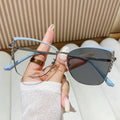 2025 Custom Logo Fashion Lens Color-changing Metal Cat Eye Glasses UV400 Photochromic Anti Blue Light Eyeglasses for Women