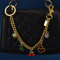 Mengda Factory Direct Sales Fashion Cherry Keychain Link Handbag Charm Chain Accessory Car Key Chain Pendant With Logo