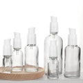 Custom Cosmetics Packing 40ml 100ml Clear Body Unique Skincare Glass Lotion Pump Bottles With White Pump
