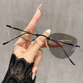 2025 Fashion Ultra Light Anti Blue Light Eyeglasses Cat Eye Rimless Photochromic Glasses for Women