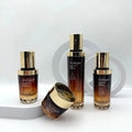 Wholesale Luxury 30m 100ml 120ml Amber Thick Bottom Cosmetic Glass Bottle With Lotion Pump Gold Cap for Cream Lotion Packaging