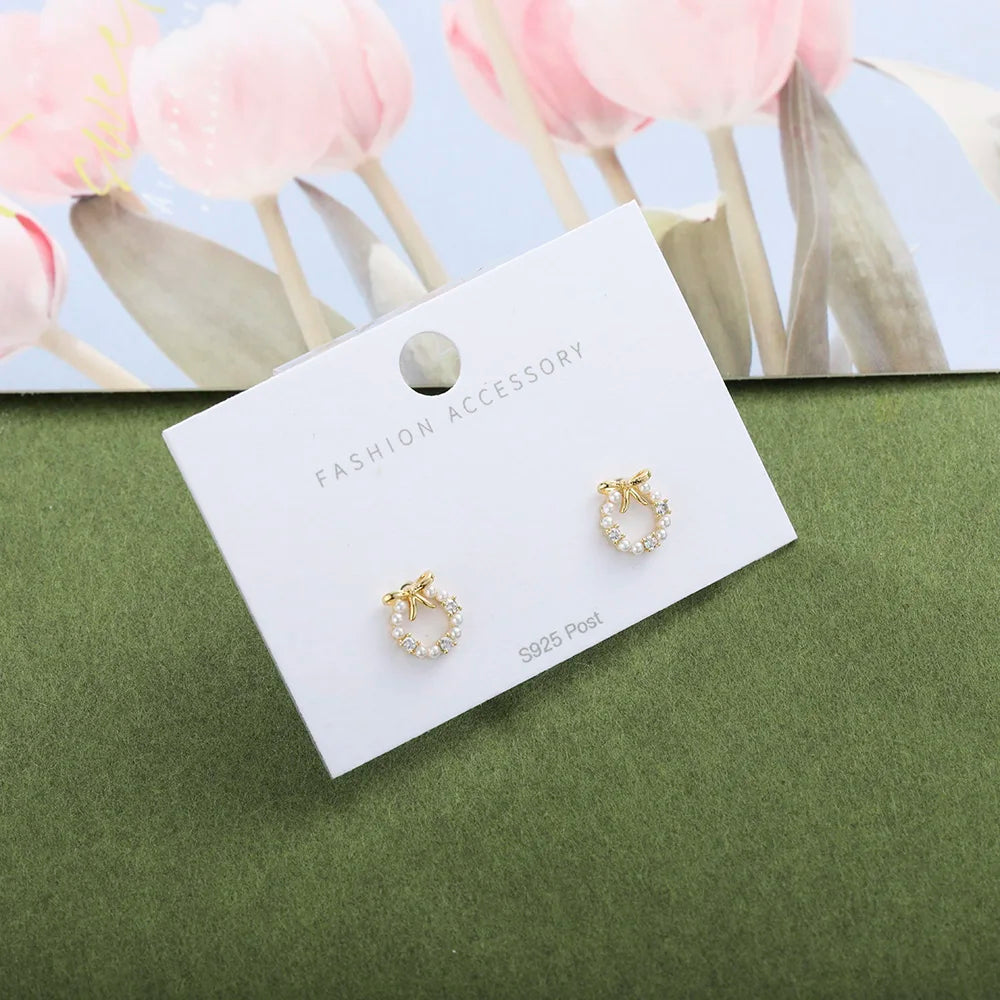 Hot Selling Silver Gold and Rose Gold Plated Brass Bowknot with Tiny Artificial Pearl Stud Earrings Light Luxury Earrings