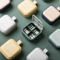 JUXINDA Customizable Logo Four-Compartment Square ABS + Silicone Eco-Friendly Weekly Pill Organizer Portable Sealed Travel Pill MegaBDM