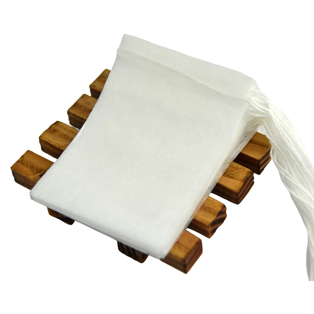 Compostable 18Gsm PLA Non-Woven Fabric Tea Set Filter Bags 100x120mm Packaged in Corn Fiber 100pcs/Bag