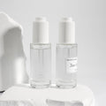 Hot Sale Press Button Thick Glass Dropper Bottle Screen Printing 1oz 30ml 100ml Clear Skin Care Serum Essential Oil Custom Color