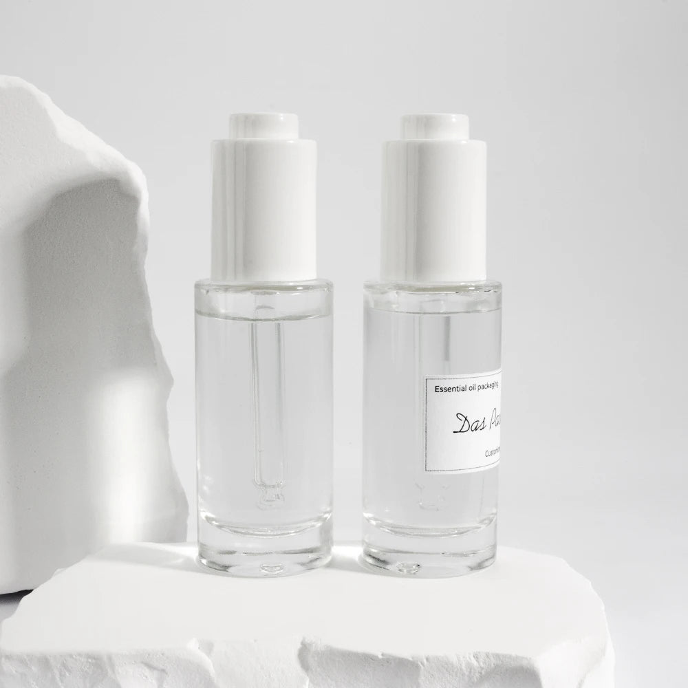 Hot Sale Press Button Thick Glass Dropper Bottle Screen Printing 1oz 30ml 100ml Clear Skin Care Serum Essential Oil Custom Color