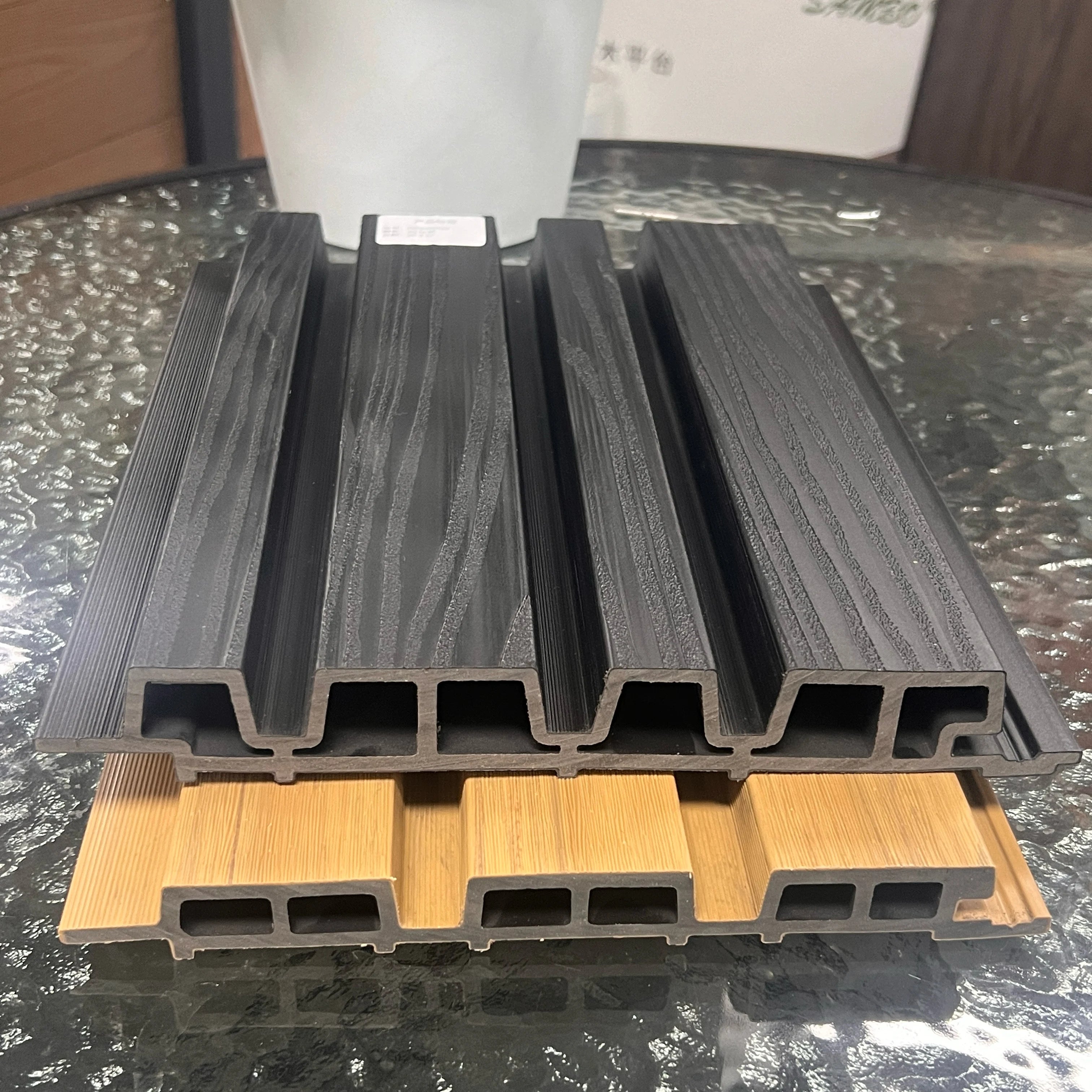 Luxury Modern UV Resistant WPC Wall Cladding Waterproof Exterior Wall Panels Fireproof Striped Facade Villa Entertainment