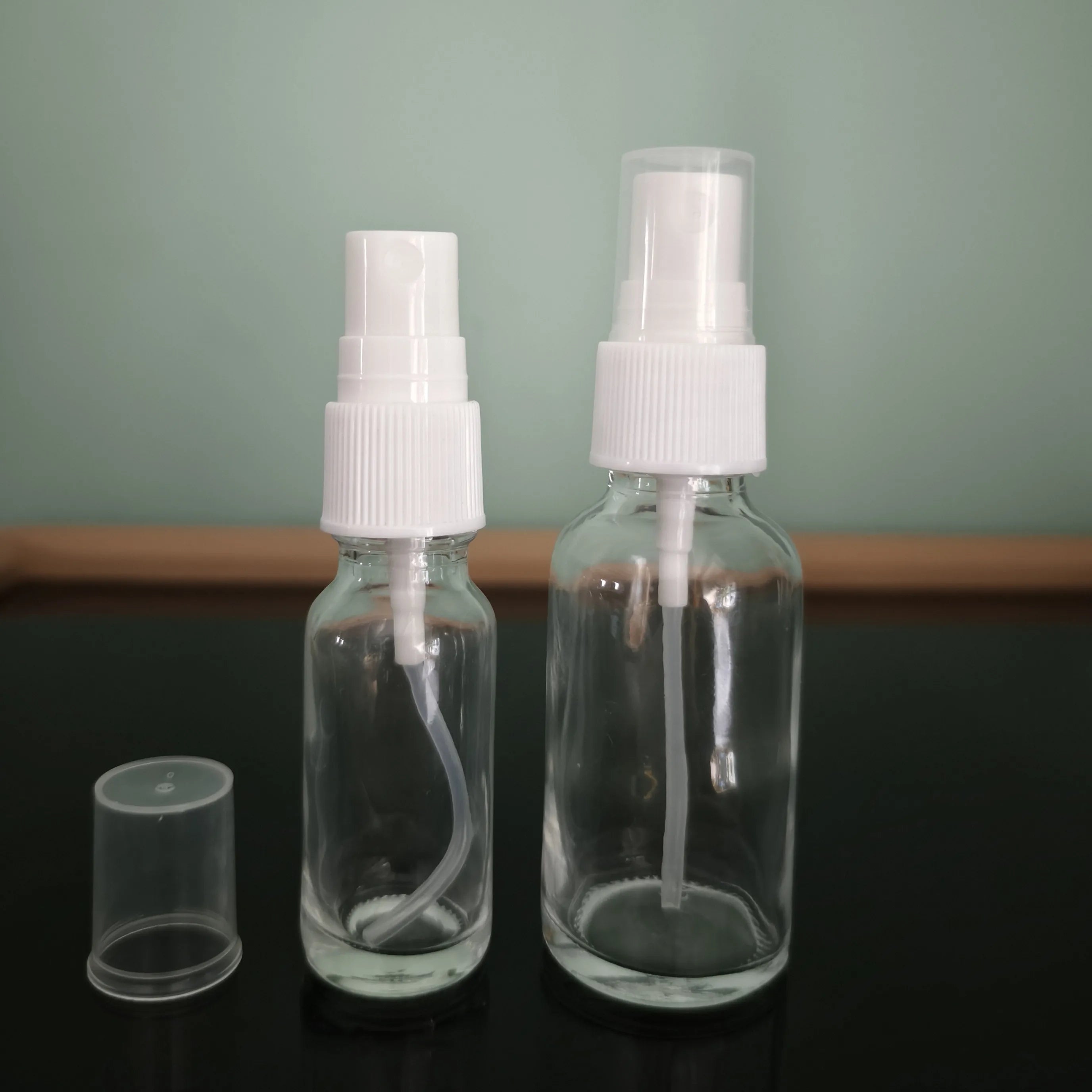 0.5 OZ 1 OZ 2OZ 30ml Clear Boston Round Glass Spray Bottle with White Spray Cap Dropper Sealing Carton Packed
