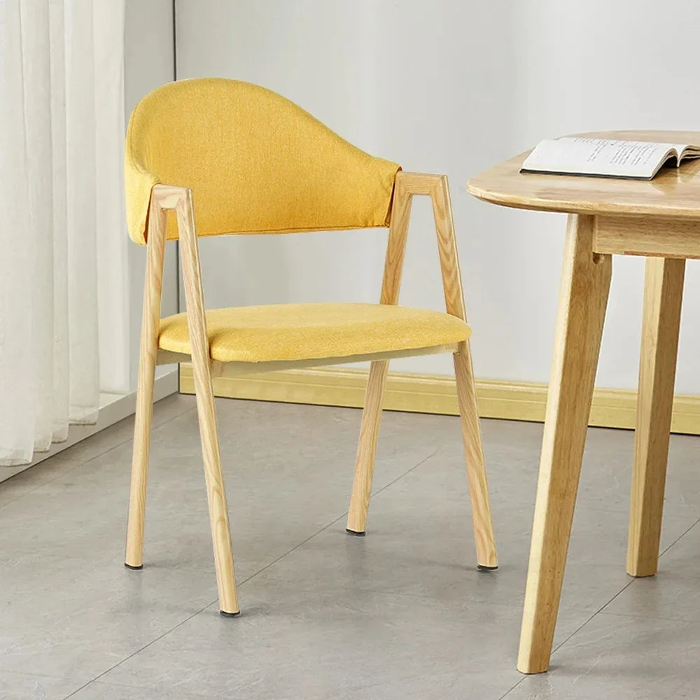 Wooden Dining Chair with Ergonomic Design Sumptuous Luxury and Textured Fabric Captivating Elegant Dining Experience Home Decor