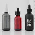Custom Luxury Clear Amber Glass Essential Oil Dropper Bottles 30ml 1oz 2oz 100ml 50ml Skin Care Cream Packaging MegaBDM
