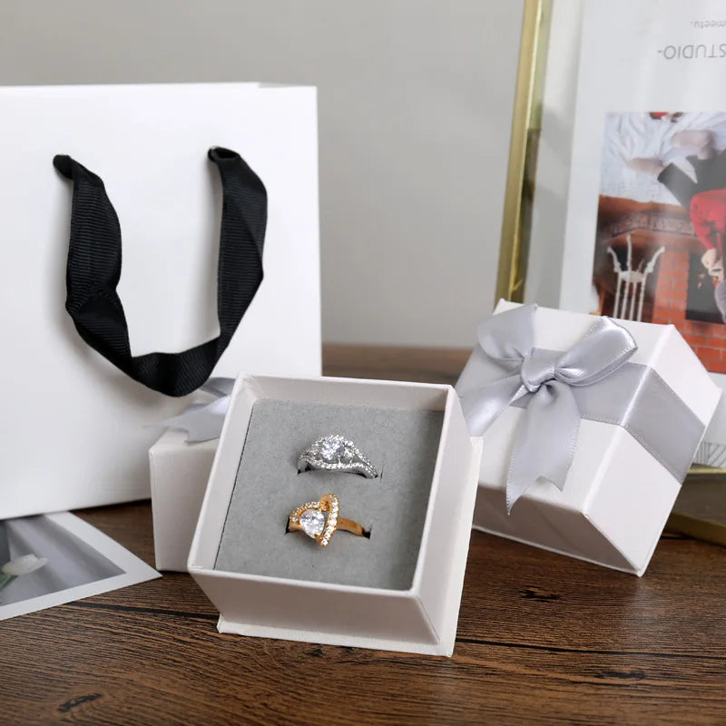 Wholesale RongZhen Rz-0251 Customized White Luxury Rectangle Jewelry Packaging Box Gold Ribbon Embossed Printing Custom Logo