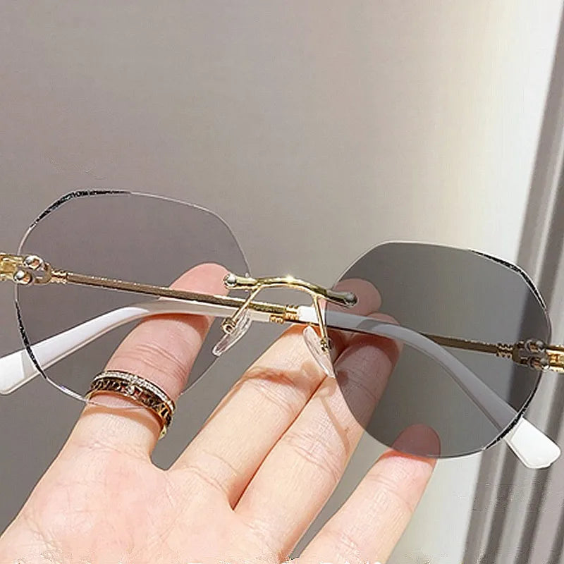 Wholesale Fashion Lens Color Changing Rimless Round Eyeglasses Frames Women Photochromic Anti Blue Light Glasses Women
