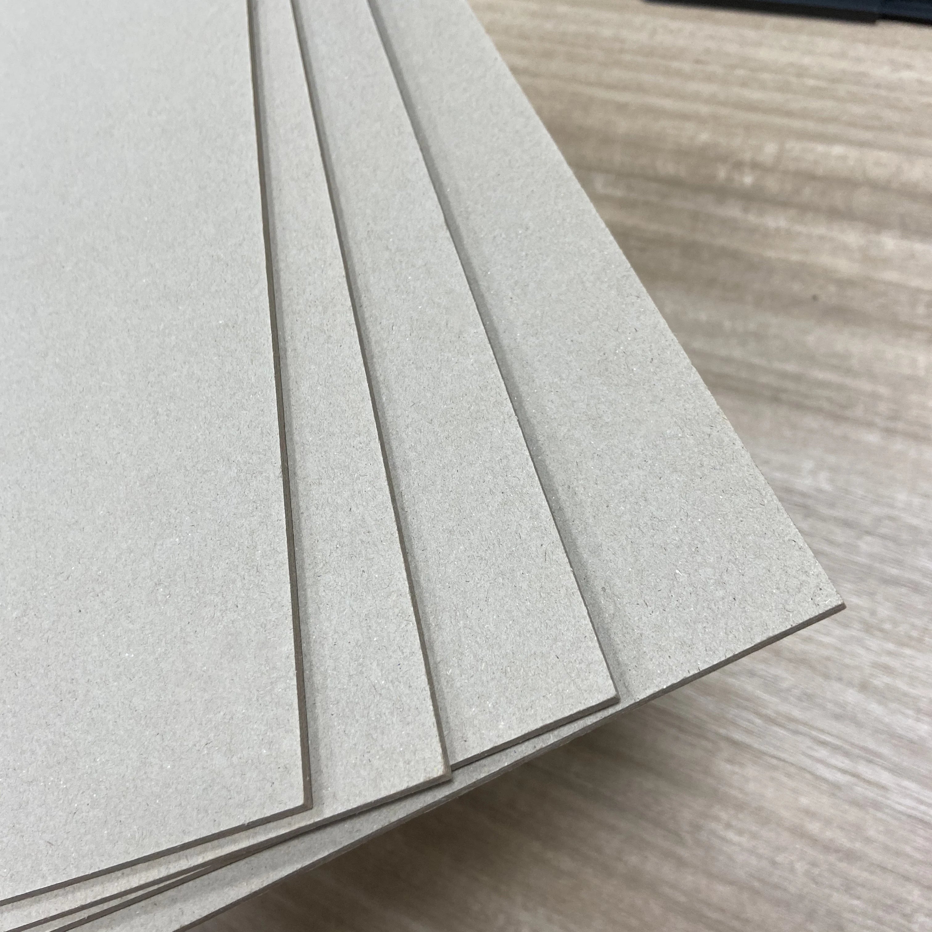 600gsm 900gsm 1200gsm Laminated Grey Board 70*100cm Rigid Cardboard (Waste Paper Pulp) Single Side for Book Binding Box Board