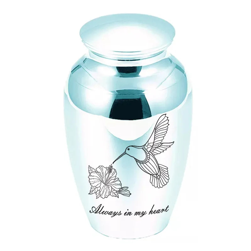 Decorative Metal Urn with Etched Paw and Heart Pattern and Engravable Nameplate for Cherished Home Showcase