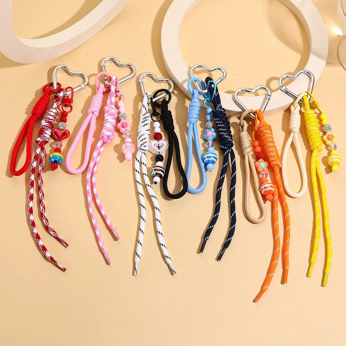 Wholesale Colorful Knotted Rope Decoration Plastic Handmade Knitted Keychain Beaded Flower Tassel Charm Keychain