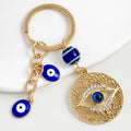 One Piece Blue Eyes Devil's Eye Tassel Alloy Plated Keychain Brilliant Diamond Style Carabiner Pendant Accessory for Bags
